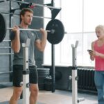 AI Fitness Coaches vs Personal Trainers: What Will the Future Look Like?